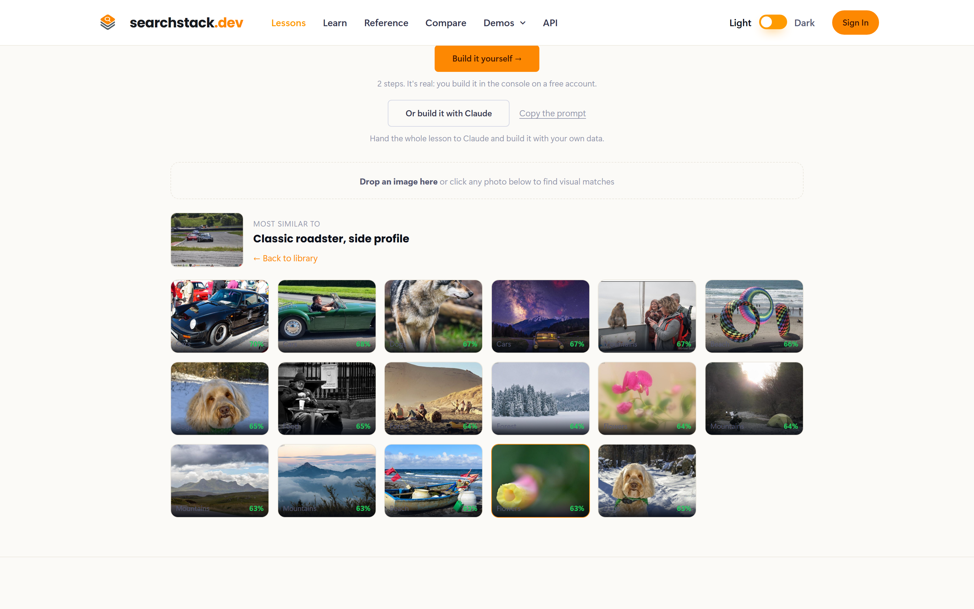 The photo search demo after clicking a photo of a classic car: the most visually similar photos come back first, cars at the top, each with a similarity percentage