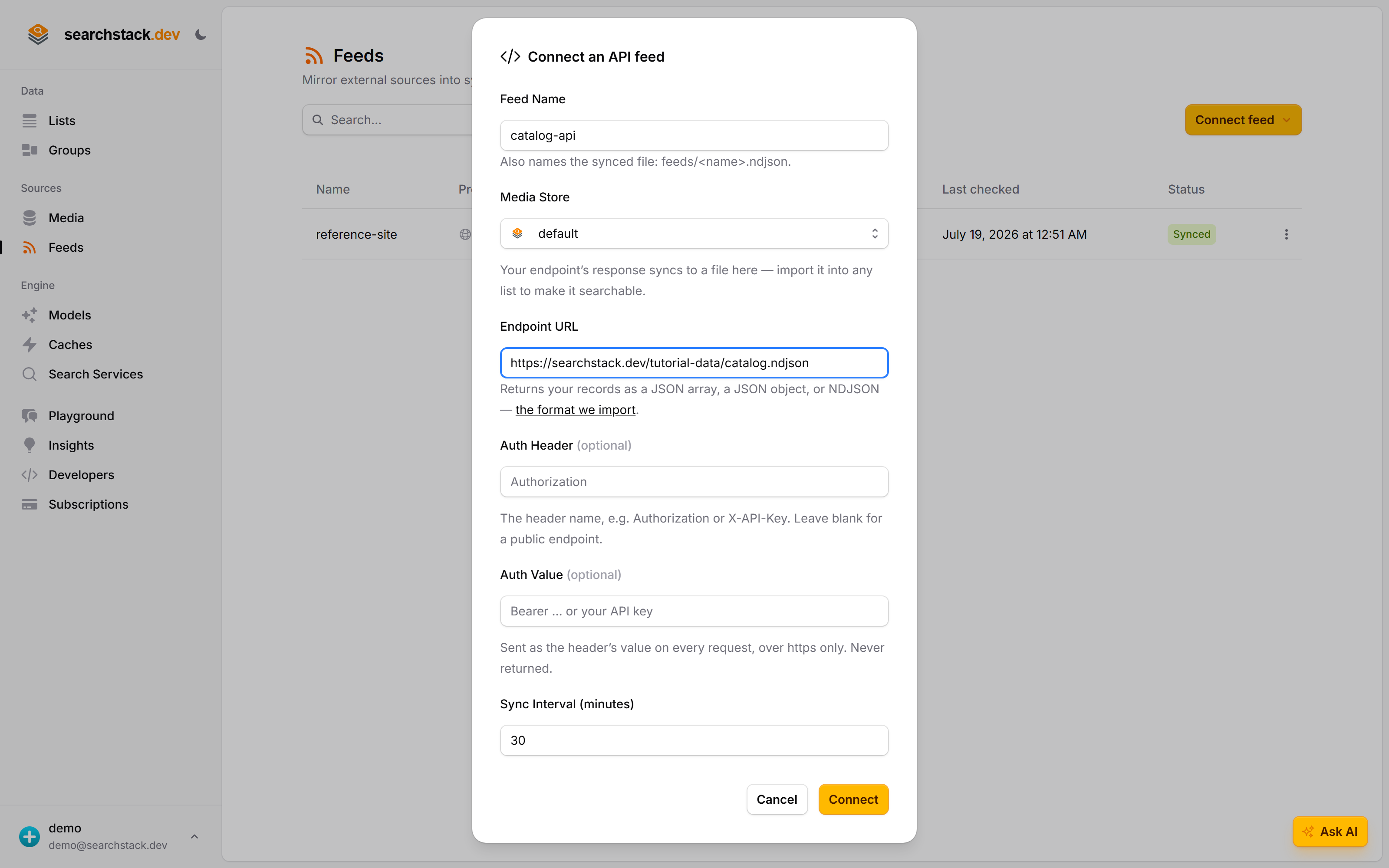 The Connect an API feed dialog: feed name 'catalog-api', the endpoint URL, an optional auth header, and the sync interval
